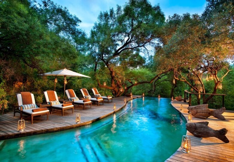 Romantic infinity pool at Rwanda honeymoon resort with sunset views and luxury loungers, Ebenezer Hotel Apartments